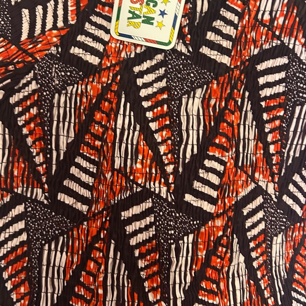 Geometric orange and purple patterned Fabric